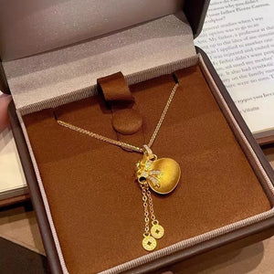 Diamond - studded Bowknot Lucky Bag Tassel Coin Necklace - Zambeel