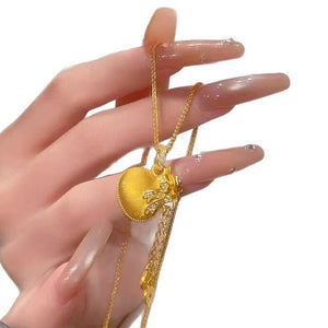 Diamond - studded Bowknot Lucky Bag Tassel Coin Necklace - Zambeel