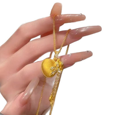 Diamond - studded Bowknot Lucky Bag Tassel Coin Necklace - Zambeel