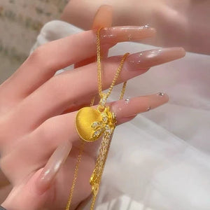 Diamond - studded Bowknot Lucky Bag Tassel Coin Necklace - Zambeel