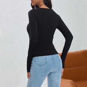 Irregularly Arranged Buttons Create A Sophisticated Top - Zambeel