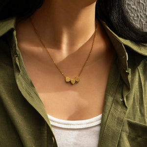 Minimalist Sleek Stainless Steel Pierced Heart Necklace With A Niche Designer Aesthetic For Women - Zambeel
