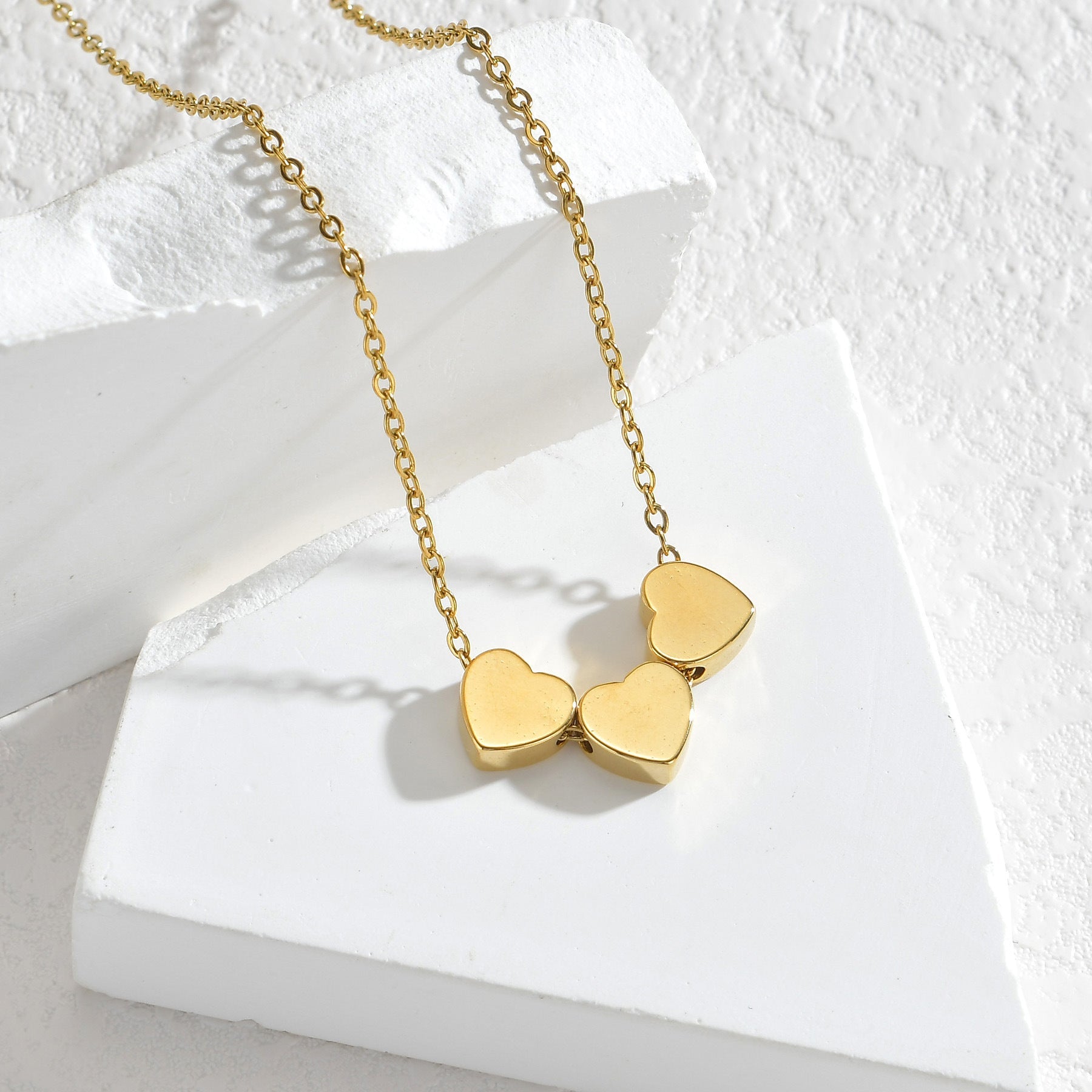 Minimalist Sleek Stainless Steel Pierced Heart Necklace With A Niche Designer Aesthetic For Women - Zambeel