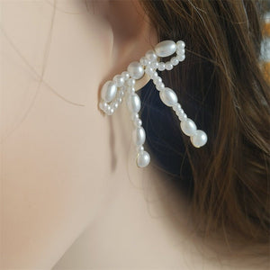Retro Artificial Pearl Bow Floral Hand - woven Earrings - Zambeel