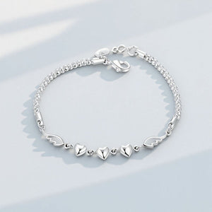 Stylish Silver - Plated Minimalist Heart - and - Feather Bracelet For Women - Zambeel