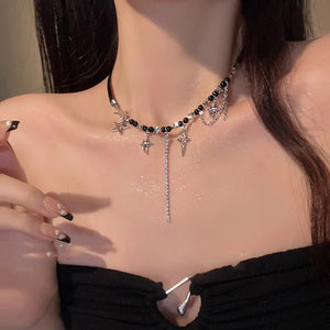 Womens Black Four - Point Star Beaded Necklace - Zambeel